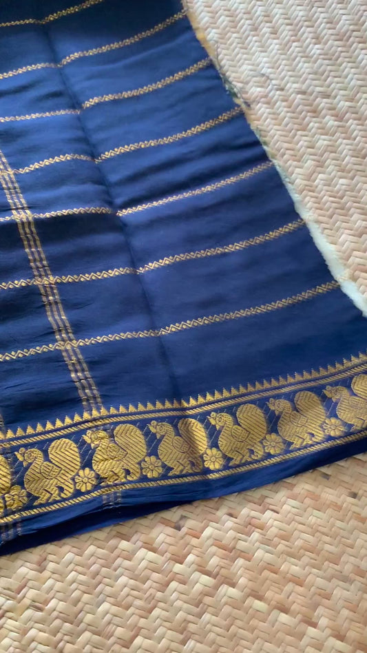 Parrot- chilli Kalamkari Hand Painted on a Madurai Velthari Sungudi Cotton saree.